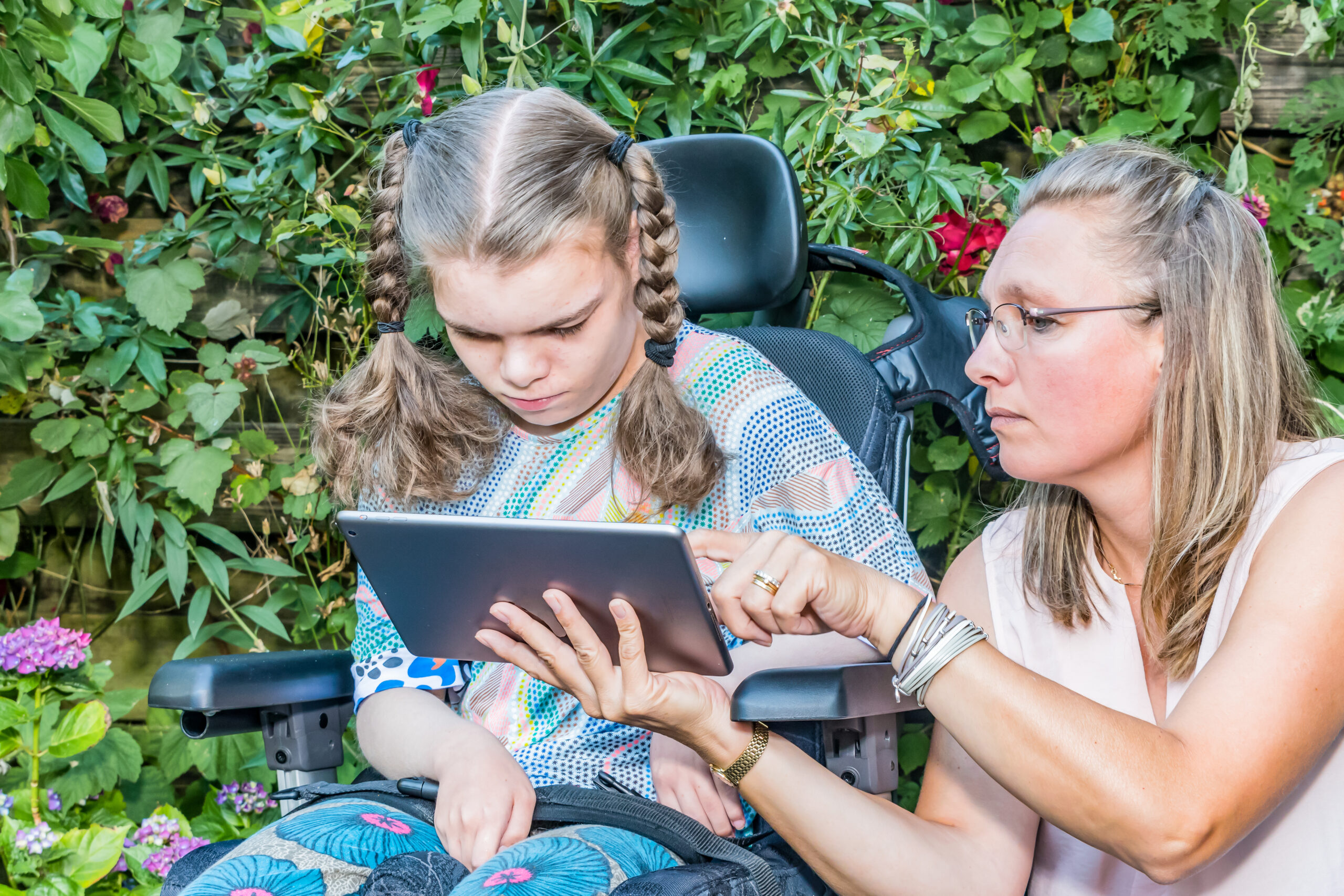 Disability,A,Disabled,Child,In,A,Wheelchair,Sitting,Outside,Looking
